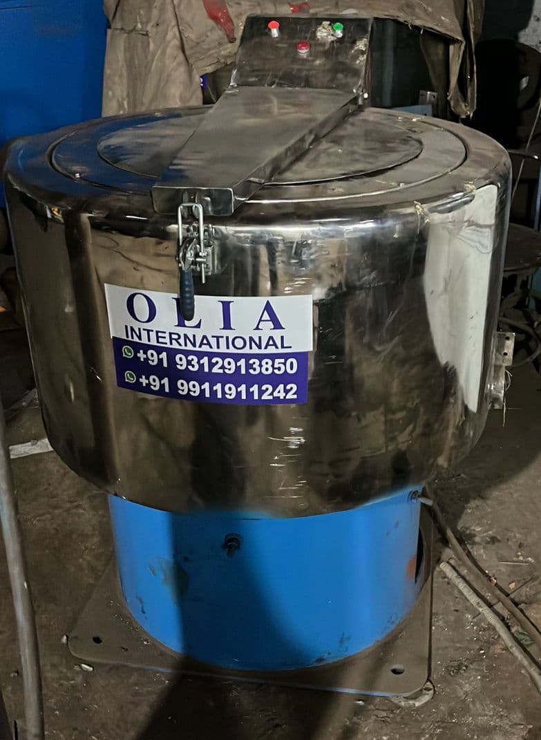 Industrial laundry machinery in production facility